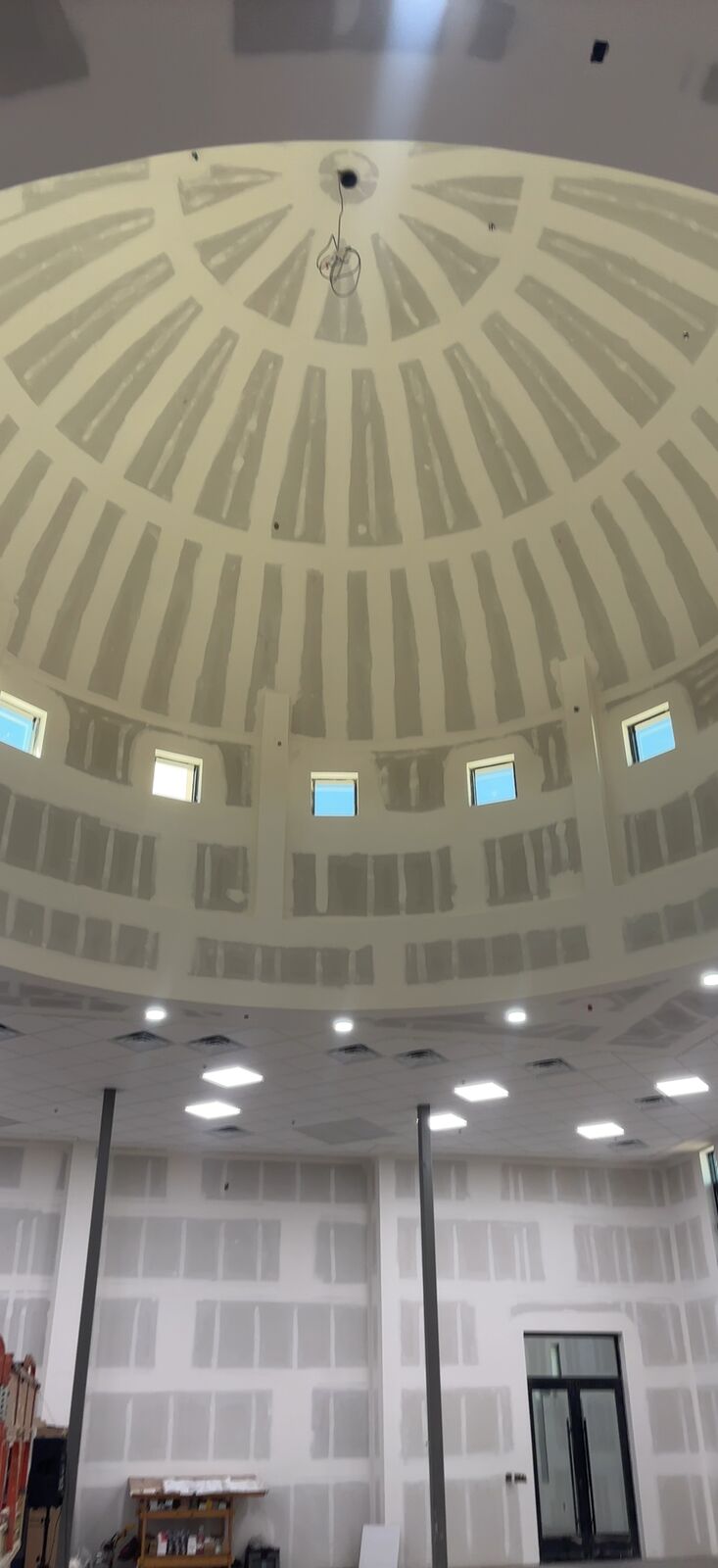 Large domed ceiling in a commercial interior prepped and painted by Shield Coat