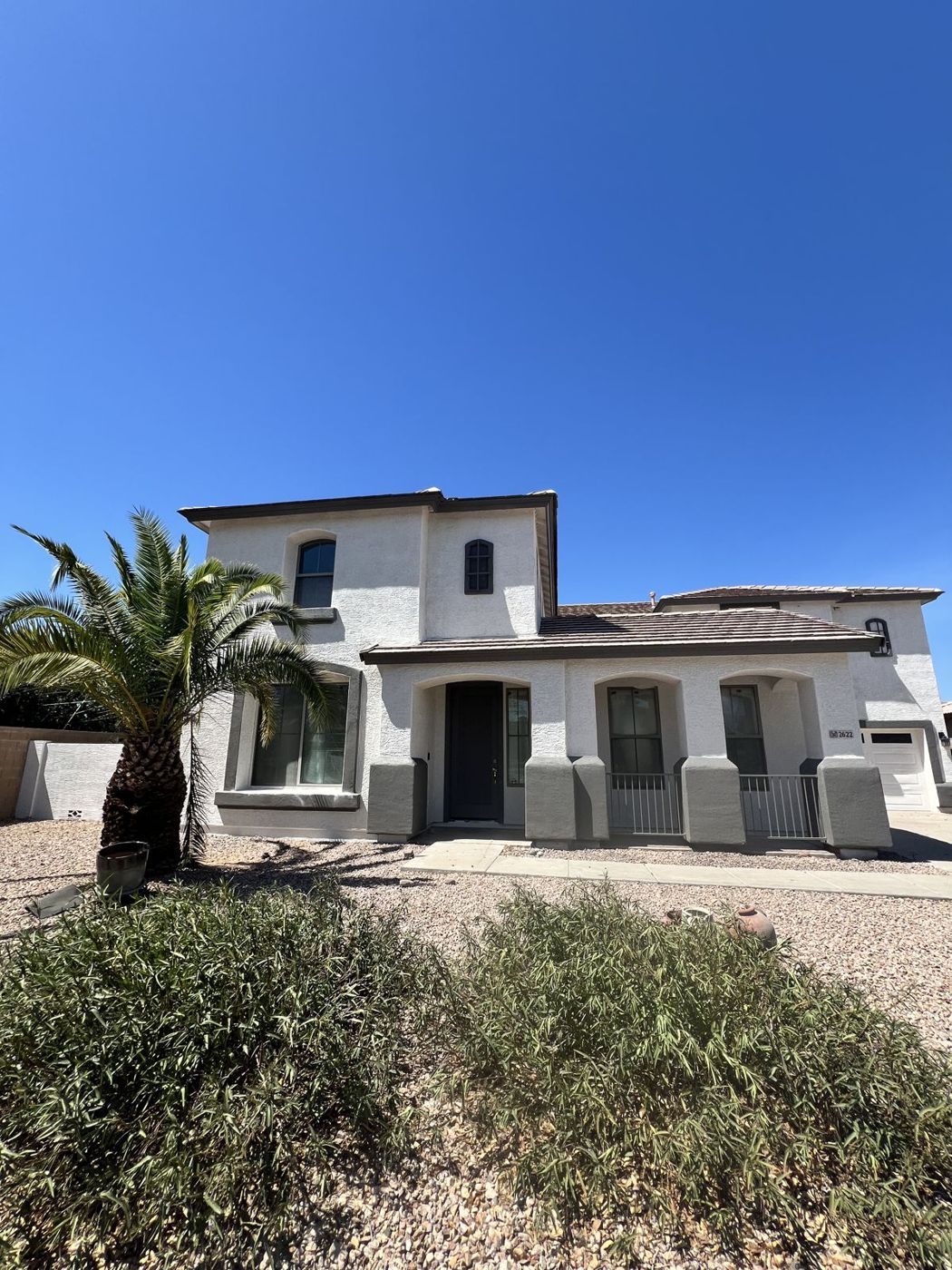 Finished two-story stucco exterior repaint in the Phoenix area